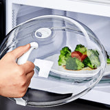 Cloche pour micro-ondes avec poignée