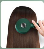 Brosse à cheveux auto-nettoyante