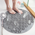 Massaging bath mat