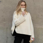 Pull col roulé en cotton et à rayures