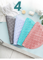 Massaging bath mat